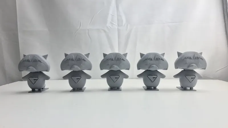Five Betty 3D figurines in a row
